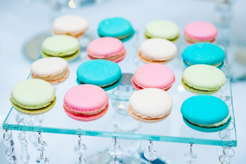 colorful macaroons on a white plate