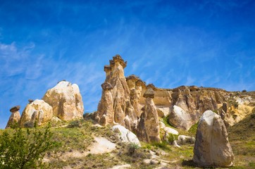 Fototapeta premium Rocks looks like mushrooms near Cavusin, Cappadocia, Turkey.
