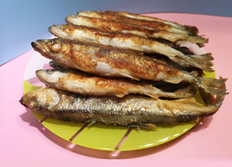 fried smelt on a plate