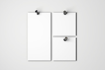Blank white poster mock up pinned to a plain grey wall. 3D rendering