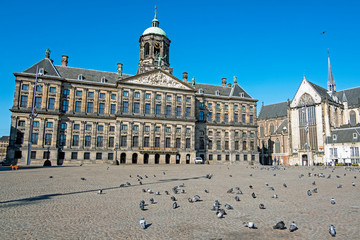 City scenic from Amsterdam at the Dam Square with the Royal Palace in the Netherlands