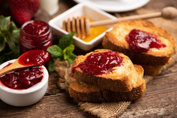 Fresh strawberry jam with bread for breakfast