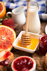 Breakfast with bred, honey strawberries jam
