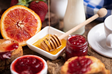 Breakfast with bred, honey strawberries jam