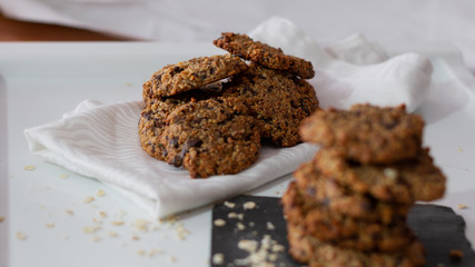 OAT AND BANANA COOKIES ON A WHITE BACKGROUND