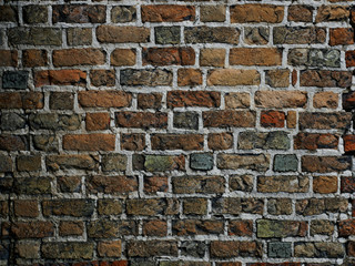 Detail of a medieval castle brickwall, dark hues