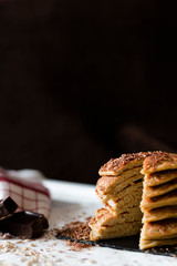 OAT CAKES WITH CHOCOLATE ON A BLACK BACKGROUND