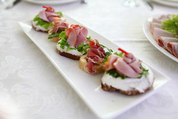 catering services background with snacks on guests table in restaurant at event party