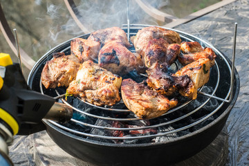 
Frying meat in a pan