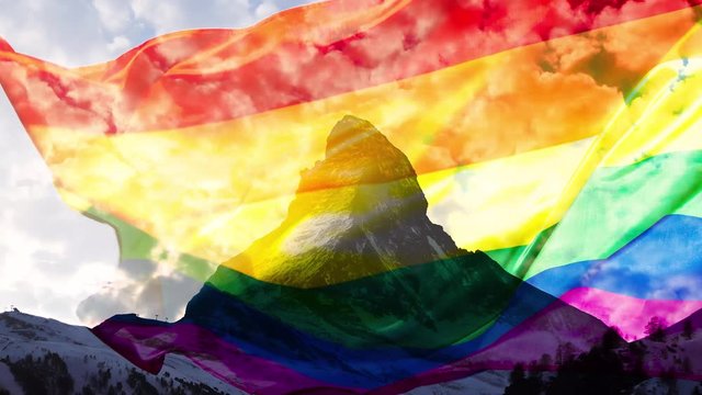 matterhorn time lapse fast moving clouds and rainbow flag double exposure