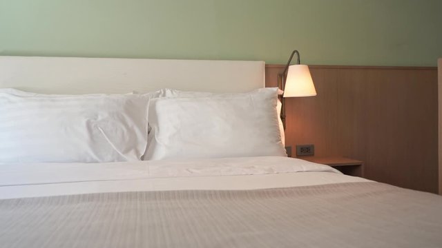 Kungsize Double Bed in Bedroom of Hotel Apartment, Close Up Pan
