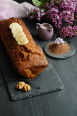 Banana bread with vanilla and cocoa on a black background 