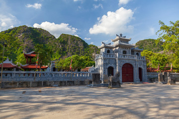 Fototapeta na wymiar Ninh Bin, Vietnam. Pagoda Beach Dong is a unique temple located inside the karst mountain. Another name is Grotto of the Green Pearl. Tam Coc National Park,