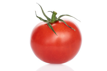 One whole fresh red cherry tomato isolated on white