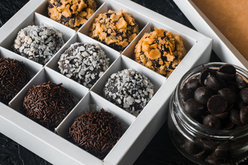 Homemade chocolates in a box. Homemade sweets. Chocolate. Present. Love. Date