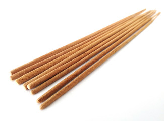 Aerial view of natural wood incense sticks isolated on white background.