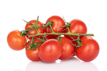Lot of whole fresh red cherry tomato isolated on white