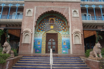 colorful, artistic, creative, old fashioned hole building near the highway