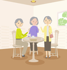 お店で会話を楽しむ老婦人たち
