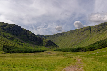 The Valley Floor and stone footpath through Glen Doll in the Angus Glens, part of the Cairngorm National Park.