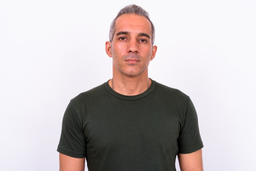 Fototapeta premium Portrait of handsome Persian man looking at camera