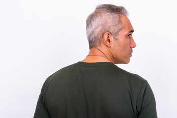 Obraz premium Rear view of handsome Persian man looking away