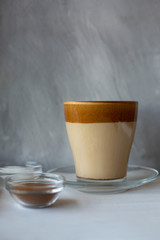Dalgona coffee is a trendy drink from Korea. Popular whipped coffee with cold milk.