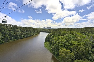 Fototapeta premium Kuranda rainforest and scenic skyrail above a river