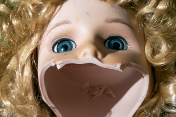 Broken China Doll Face and Head Close Up
