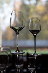 The row of wine glasses on a sill.