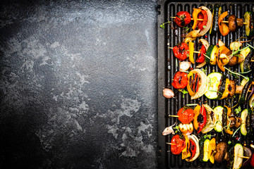Grilled Vegetable Skewers with Herbs and Spices. Top View. border Background