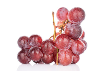 Lot of whole fresh red globe grape isolated on white