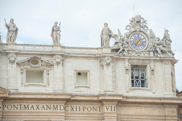 Vatican, Rome / Italy 10.02.2015.Statues on the roofs of the Papal Basilica of Saint Peter in the...