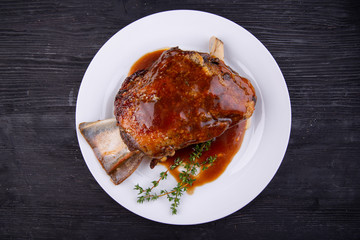 Meat ham baked on grill with sauce
