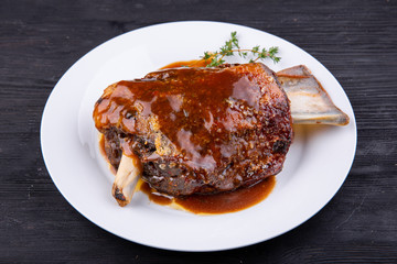 Meat ham baked on grill with sauce
