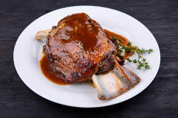 Meat ham baked on grill with sauce
