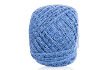 One whole blue thread spool isolated on white