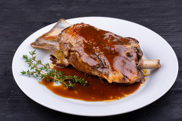 Meat ham baked on grill with sauce
