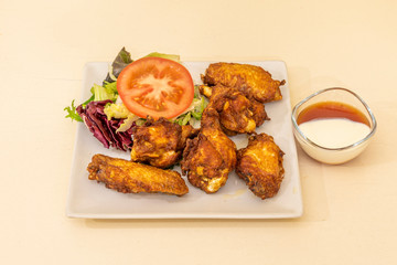 Portion of chicken wings