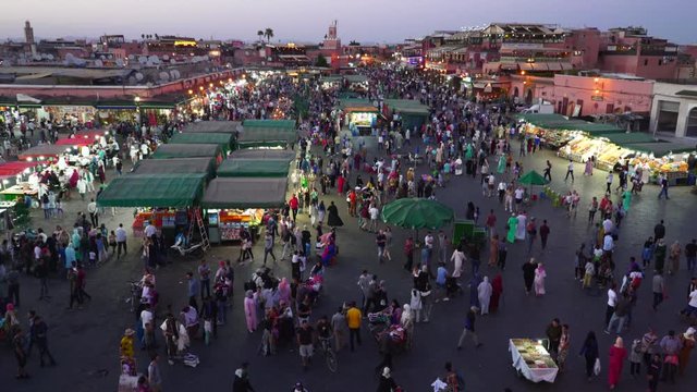 high angle night shot of market stalls at the jemaa el-fnaa market in marrakesh, morroco