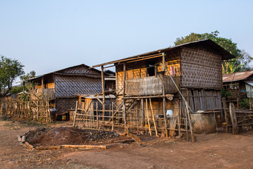 Fototapeta na wymiar Inle Lake, Myanmar »; March 2018: A wooden peasant house near Inle Lake