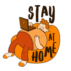 Stay at Home. Man lying on a pouf using the computer