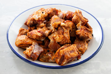 lamb marinated with red pepper, garlic and black pepper