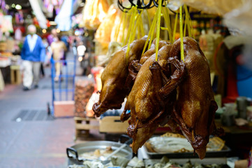Dried stewed duck hang with rope for sale in the market at Chinatown, Bangkok