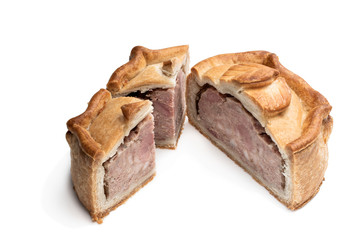 Seasoned cured pork and ham pie isolated on white
