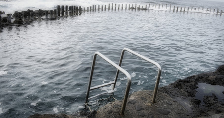 Natural Pool whit sea water, Atlantic Ocean wave in the canary coast.