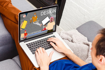 Fototapeta premium handsome hipster modern man designer working home using laptop at home