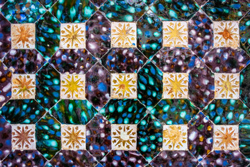 Fototapeta premium Traditional tiled wall decoration in a city palace in Seville, Spain