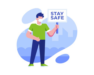 A Man Wears A Mask And Holds A Board That Says Stay Safe