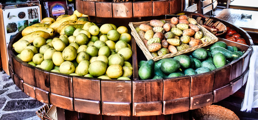 Fresh Fruit on exposed on a old wooden shelf.